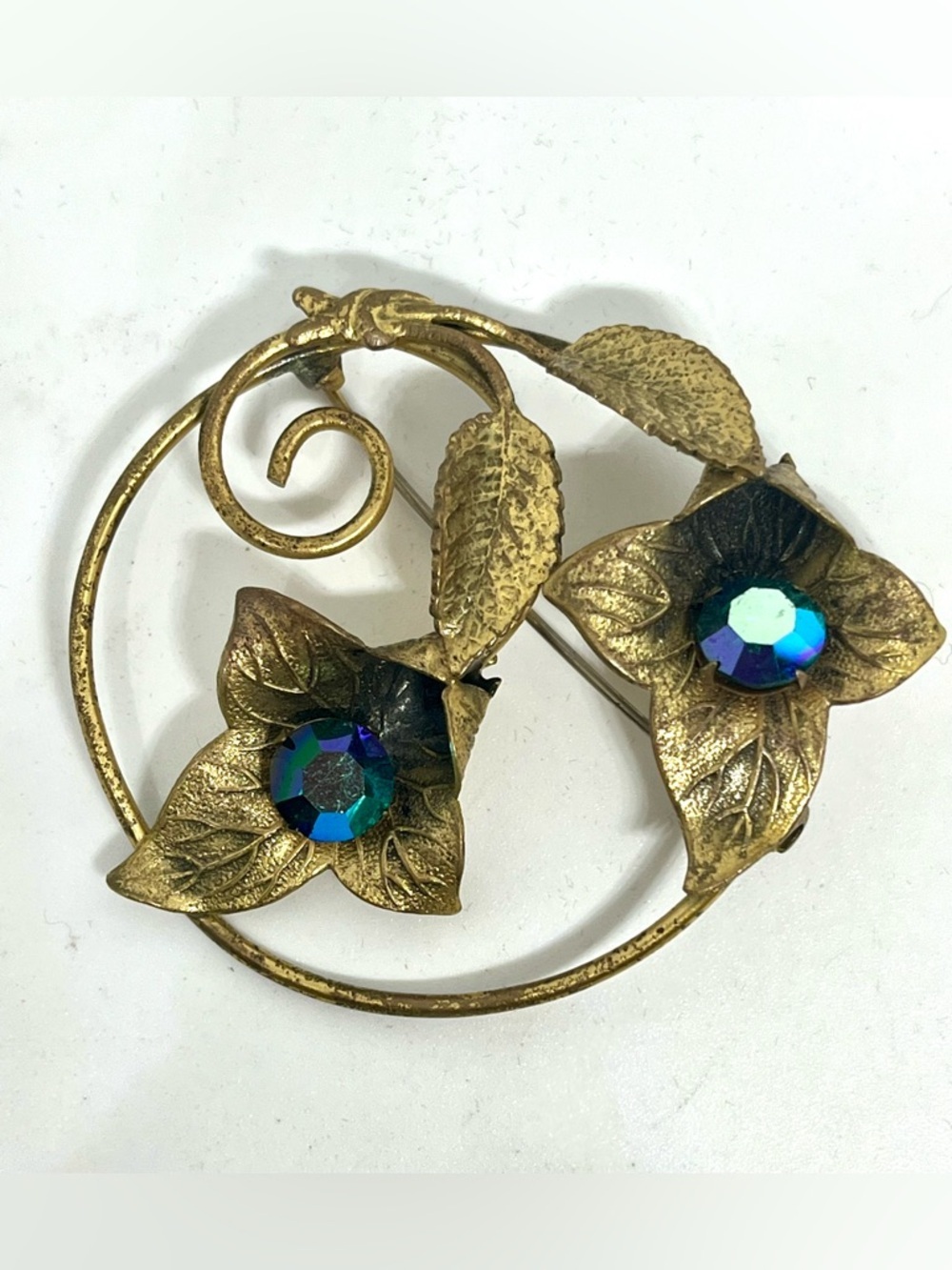 Vintage Gold-Tone Floral Brooch with Blue-Green Aurora Rhinestones